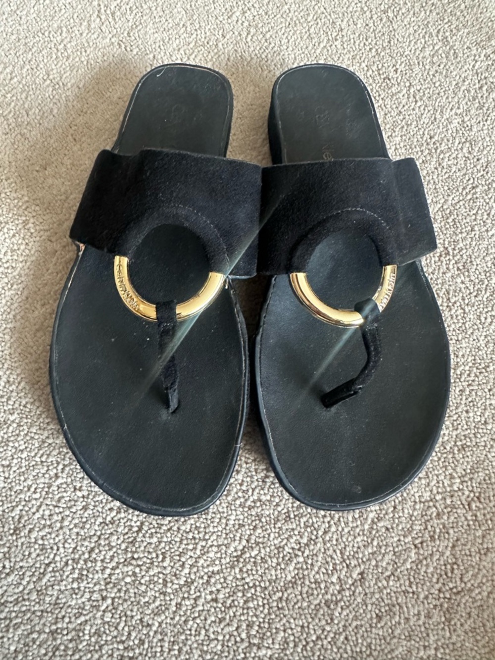Calvin Klein Women’s Black Suede Slide Sandals with Gold Ring Accent